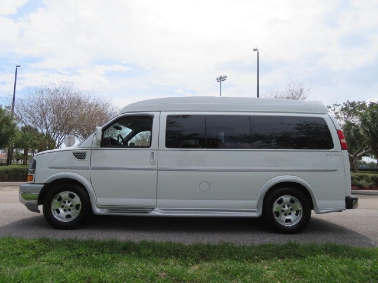 2010 White /Gray Chevrolet Express (1GNUGCD48A1) , located at 4301 Oak Circle #19, Boca Raton, FL, 33431, (954) 561-2499, 26.388861, -80.084038 - You are looking at a Gorgeous 2010 Chevy Express Handicap Wheelchair Conversion Van Explorer Limited SE with 31K Original Miles, Braun Century 750lb Side Entry Wheelchair lift, Tie Down System in the Floor, Rear Entertainment with Flat Screen TV/DVD, Leather Interior, Rear Power Folding Bench Seat/b - Photo#14